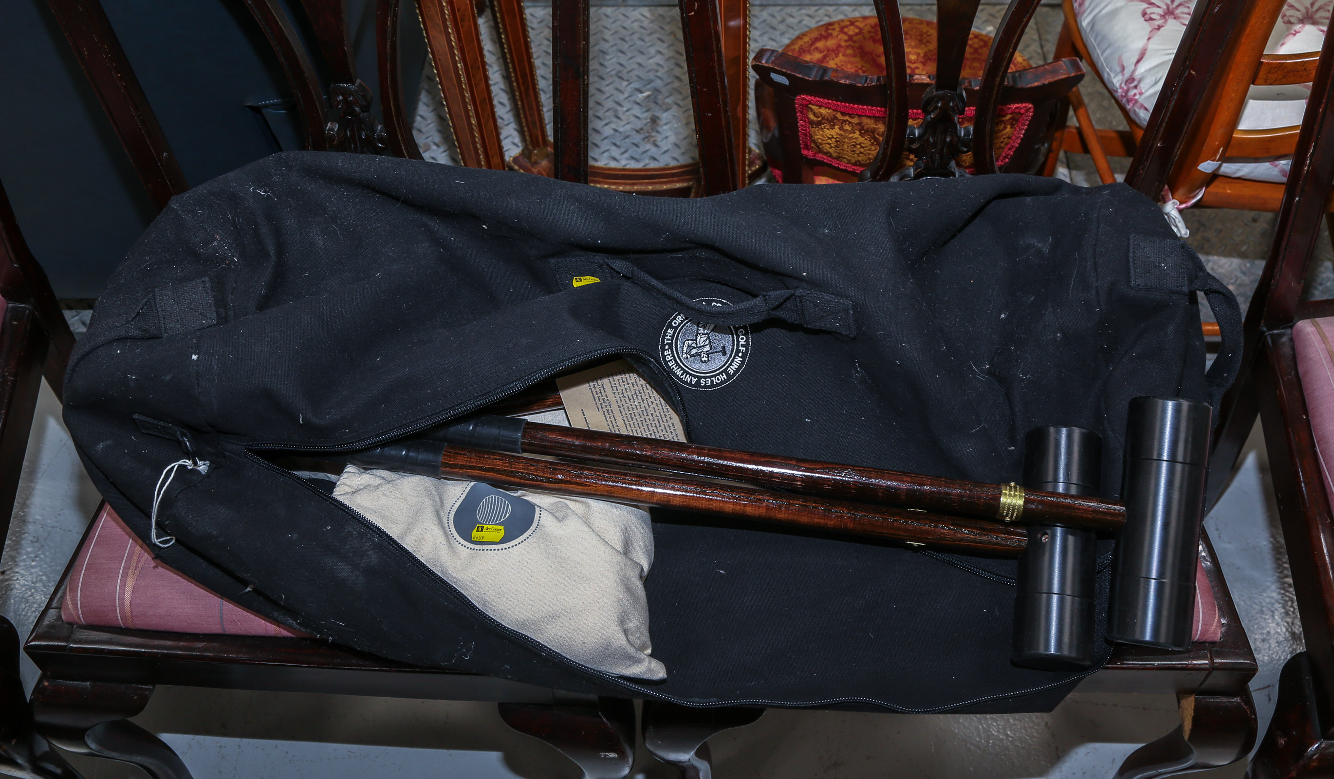 A "NINE HOLES ANYWHERE" CROQUET SET