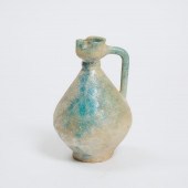 A Nishapur Turquoise-Glazed Po