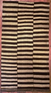 A NOMADIC FLATWEAVE CARPET, NO