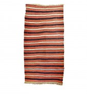 A NOMADIC FLATWEAVE RUG, NORTH