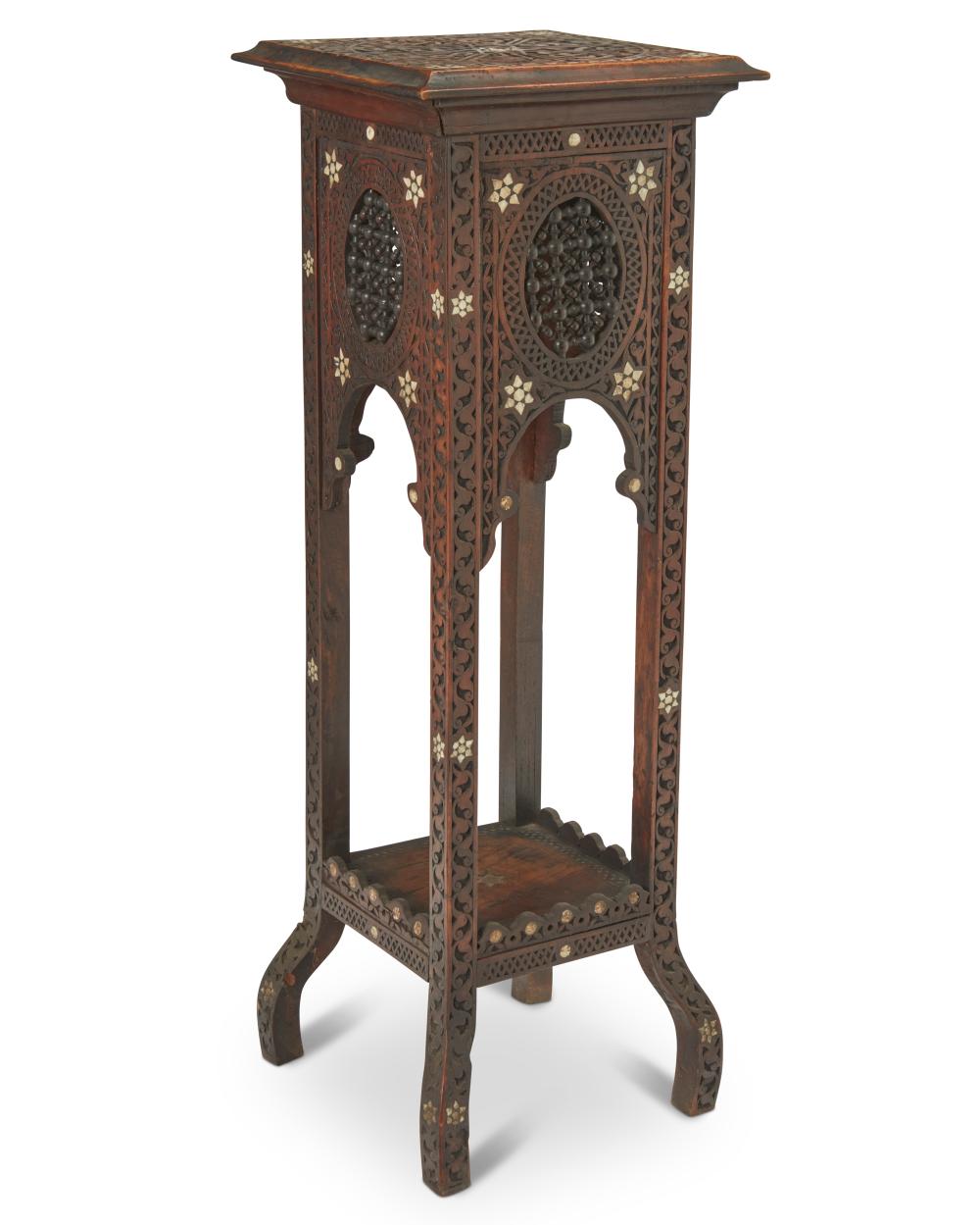 A NORTH AFRICAN CARVED WOOD