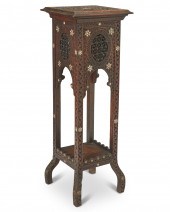 A NORTH AFRICAN CARVED WOOD ST