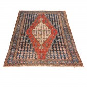 A NORTHWEST PERSIAN CARPET A N