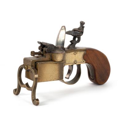 A novelty cigarette lighter in