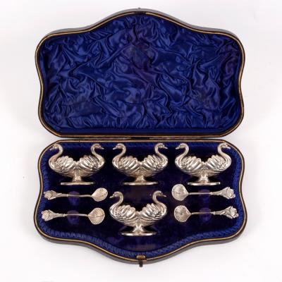 A novelty set of four silver