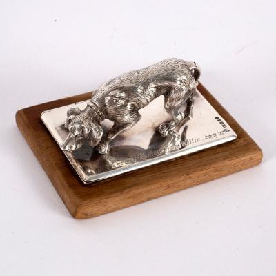 A novelty silver letter clip of dog