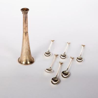 A novelty silver table lighter of