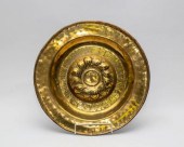 A Nuremberg brass alms dish, l