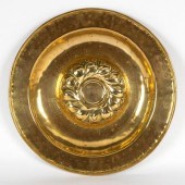 A Nuremberg brass alms dish wi