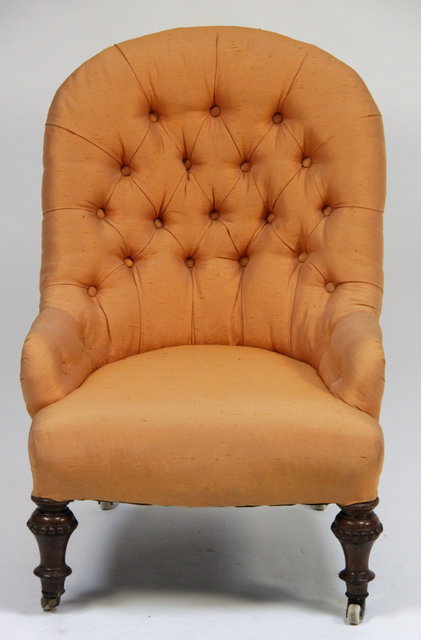 A nursing chair with deep button