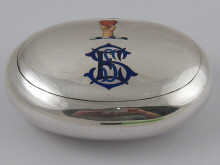 A oval tobacco box decorated with
