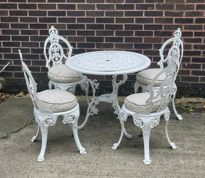 A painted aluminium garden set of