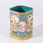A PAINTED ENAMEL FIGURE STORY