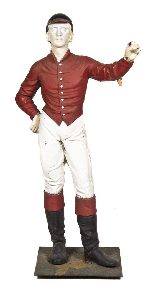 A Painted Iron Lawn Jockey in