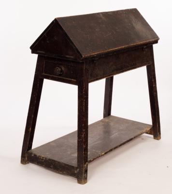 A painted pine saddle horse, the