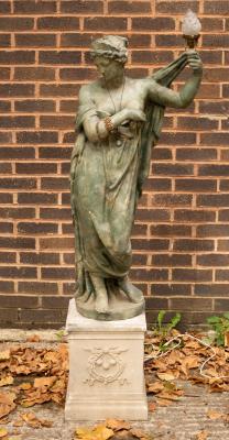 A painted plaster figure of a