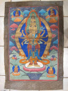 A painted wall hanging of a