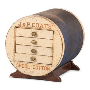 A Painted Wood Figural J&P Coats