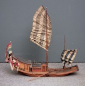 A painted wooden model of a Ch