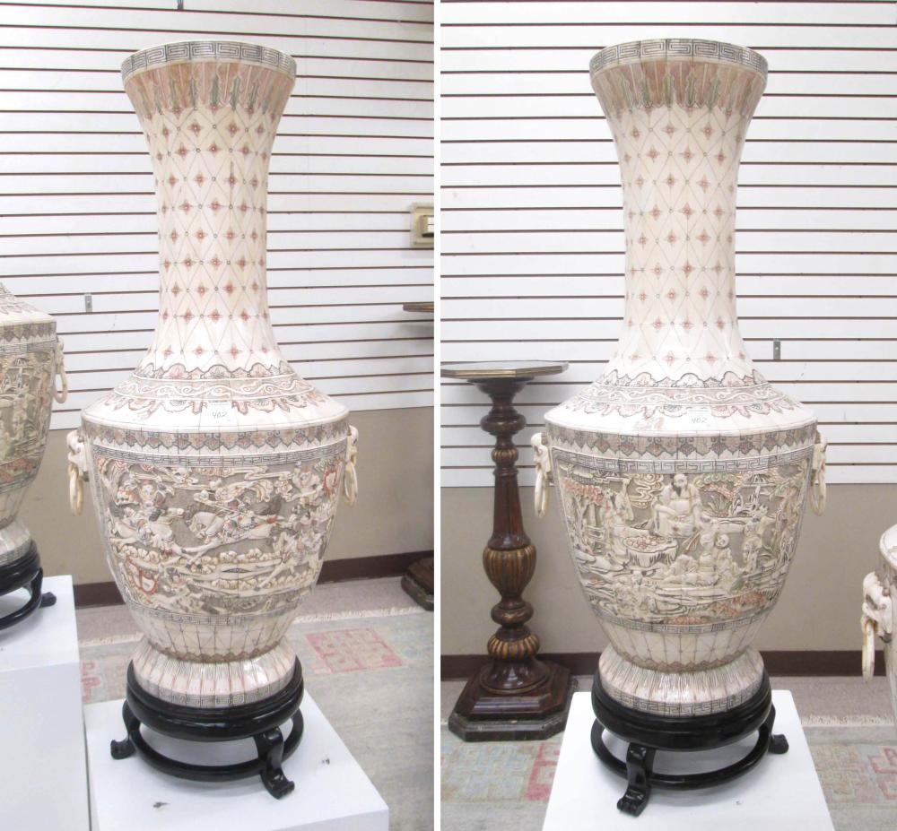 A PAIR CARVED AND ETCHED BONE