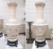 A PAIR CARVED AND ETCHED BONE