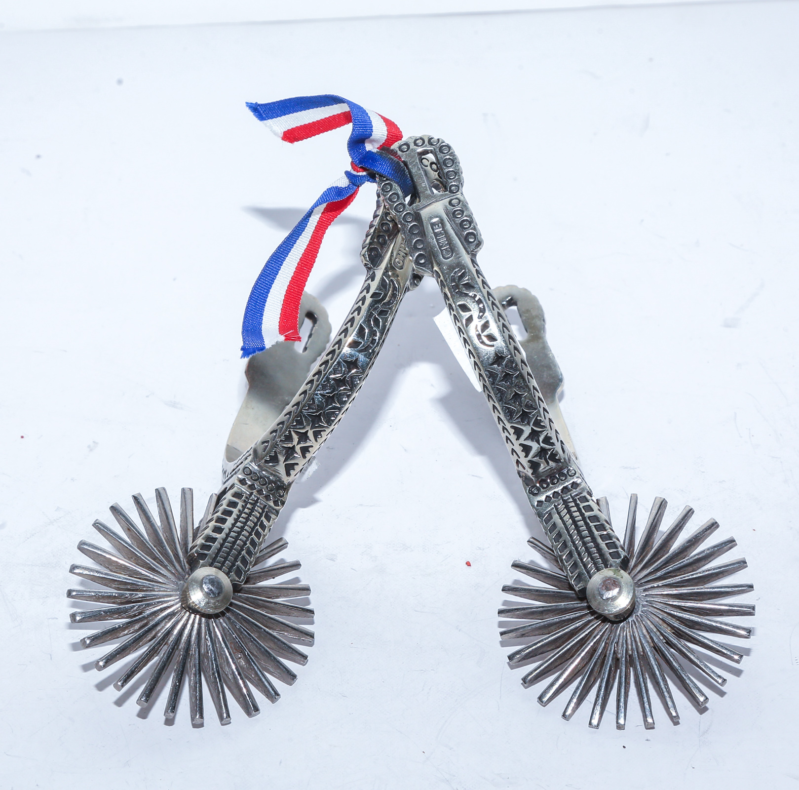 A PAIR CHILEAN STAINLESS STEEL