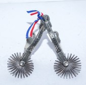 A PAIR CHILEAN STAINLESS STEEL