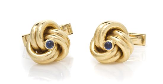* A Pair of 14 Karat Yellow Gold