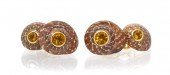 A Pair of 18 Karat Yellow Umbo