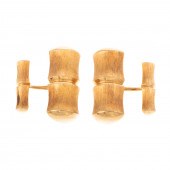 A PAIR OF 18K FLORENTINE FINIS