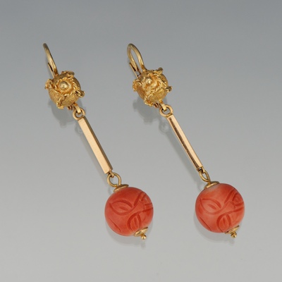 A Pair of 18k Gold and Carved Coral