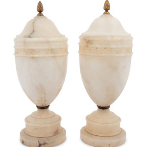A Pair of Alabaster Urns Fitted