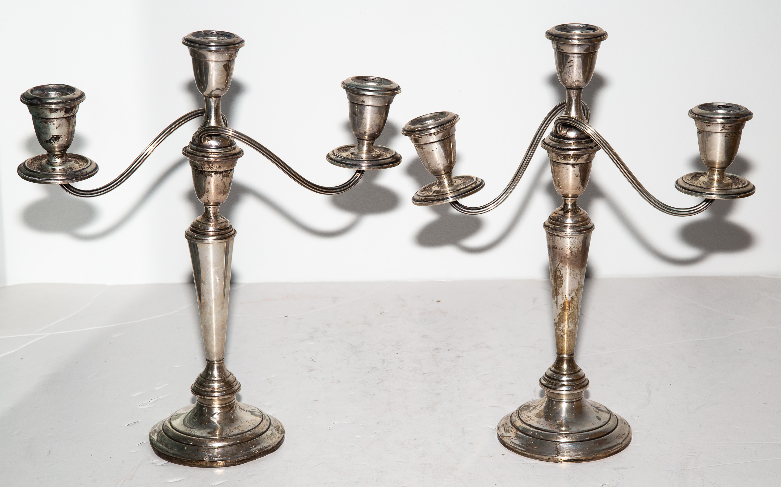 A PAIR OF ALVIN WEIGHTED STERLING
