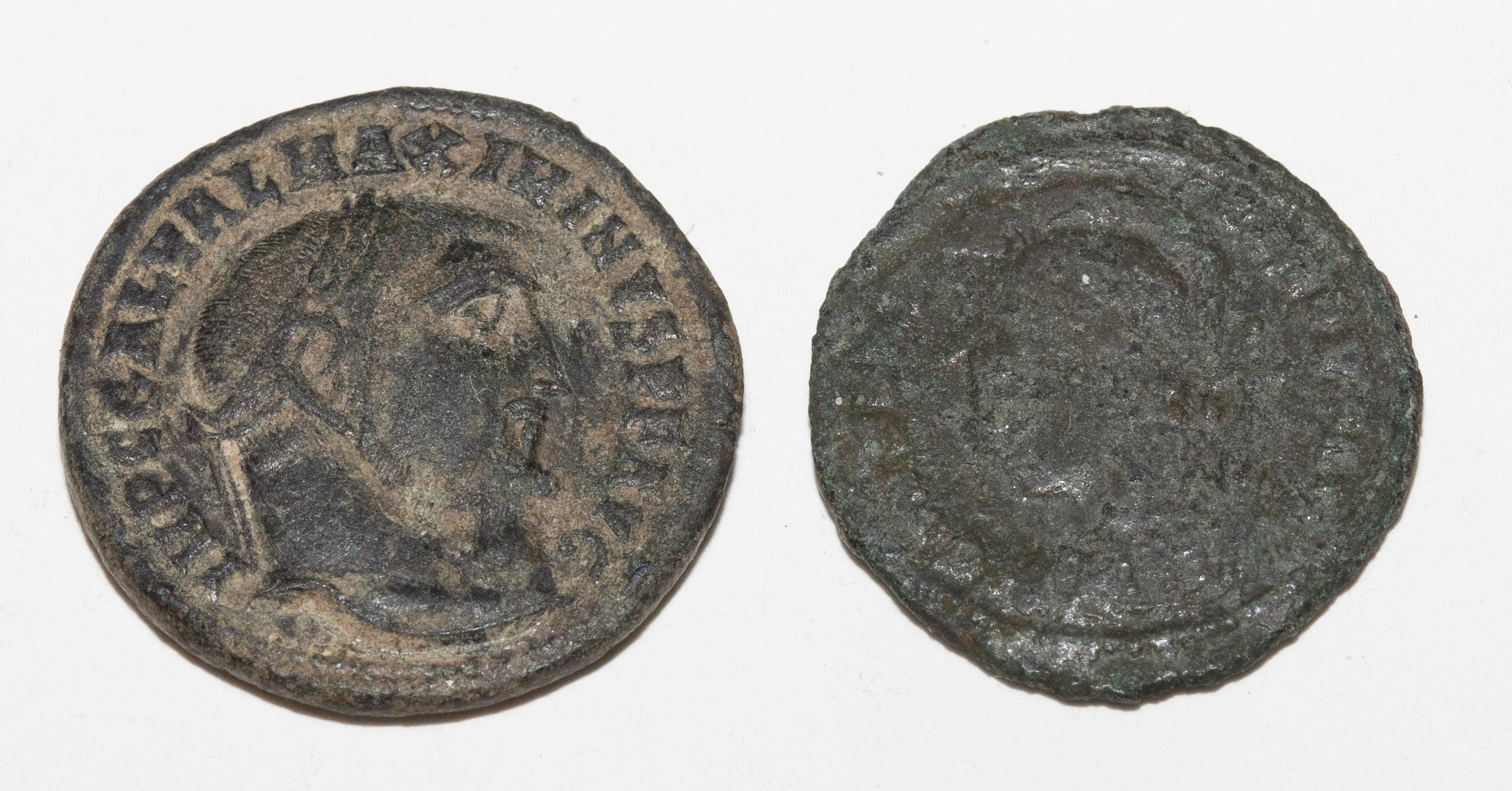 A PAIR OF ANCIENT ROMAN COINS
