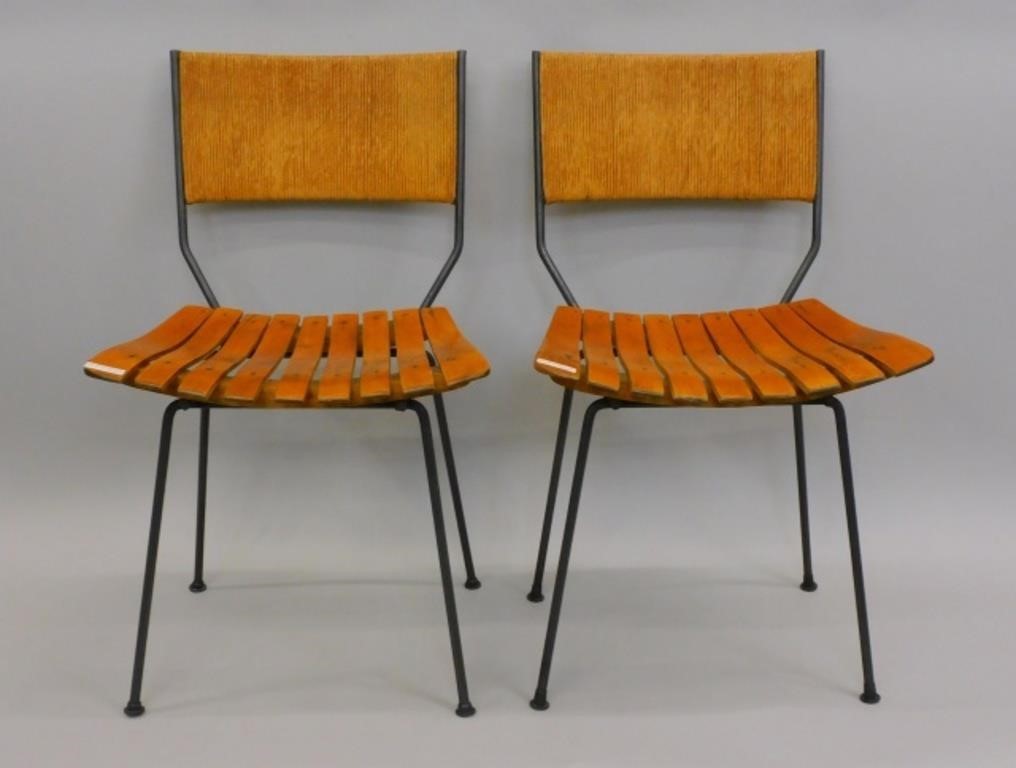 A PAIR OF ARTHUR UMANOFF CHAIRS.