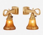 A PAIR OF ARTS AND CRAFTS POLI