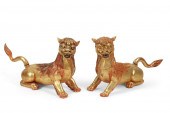 A PAIR OF ASIAN MODELS OF LION