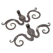 A PAIR OF BAROQUE IRON STRAP H