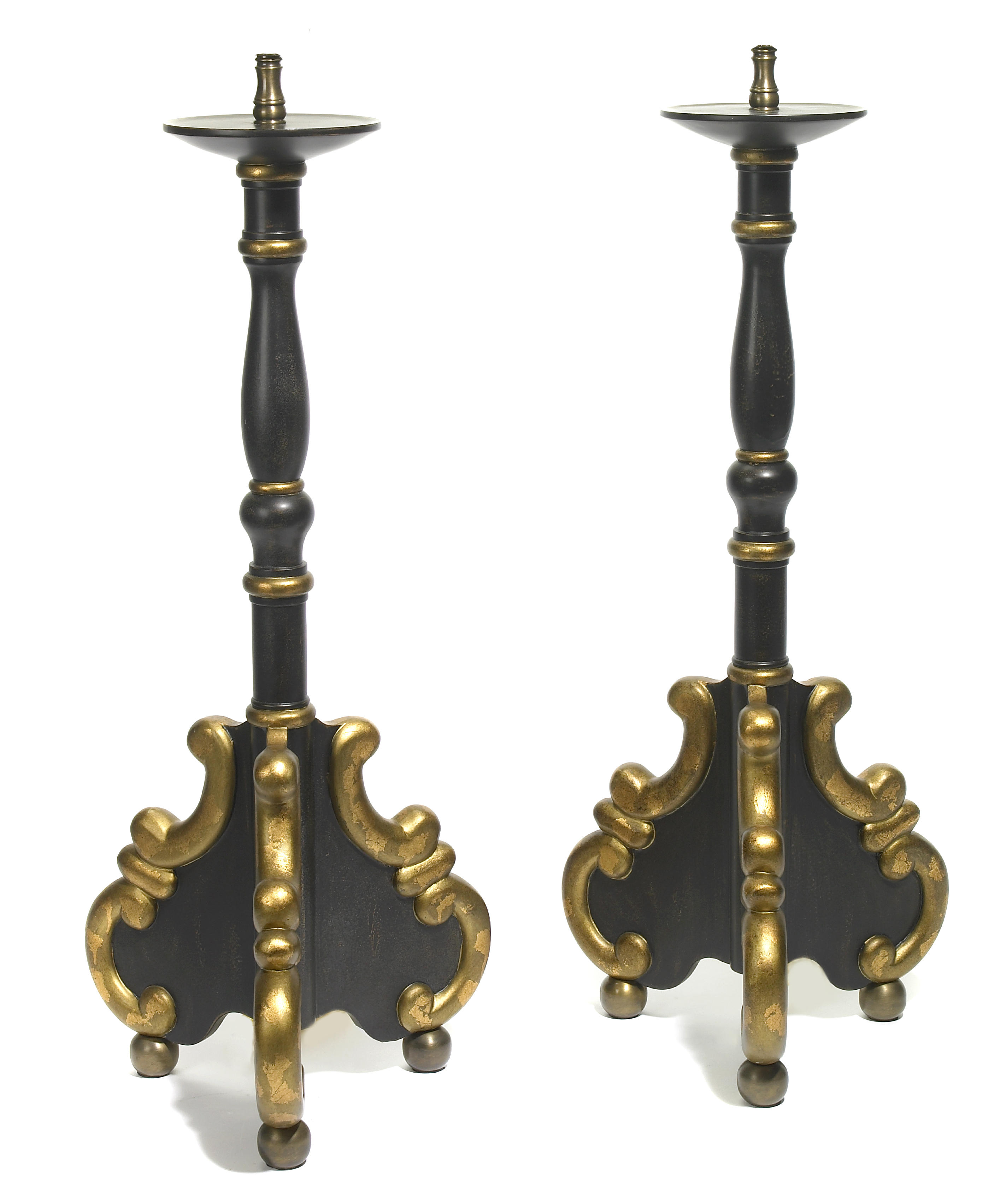 A pair of Baroque style parcel gilt