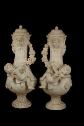 A PAIR OF BAROQUE STYLE GARDEN