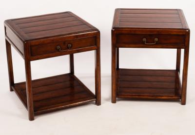 A pair of bedside tables, each