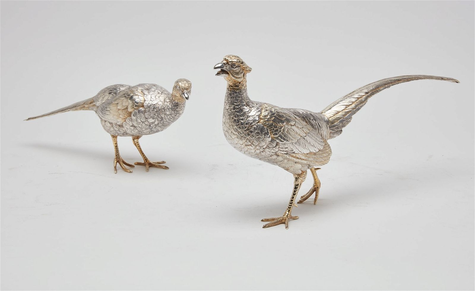 A PAIR OF BELGIAN 835 PARCEL GILT