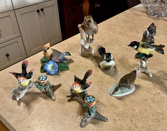 A pair of birds with nest 4.5” L, 8