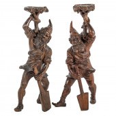 A PAIR OF BLACK FOREST CARVED