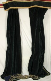 A pair of black velvet curtain