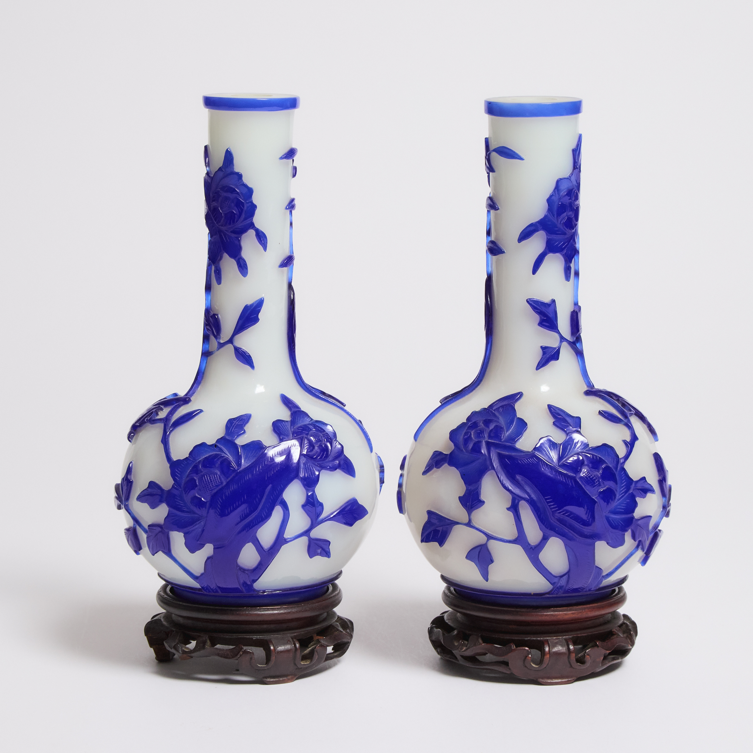 A Pair of Blue Overlay Glass 'Birds