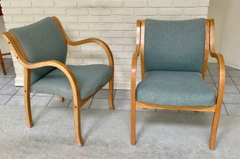 A pair of blue tweed upholstered