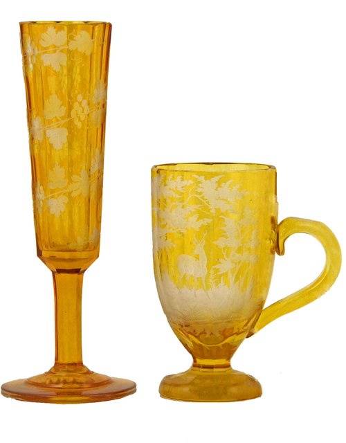A pair of Bohemian amber glasses of