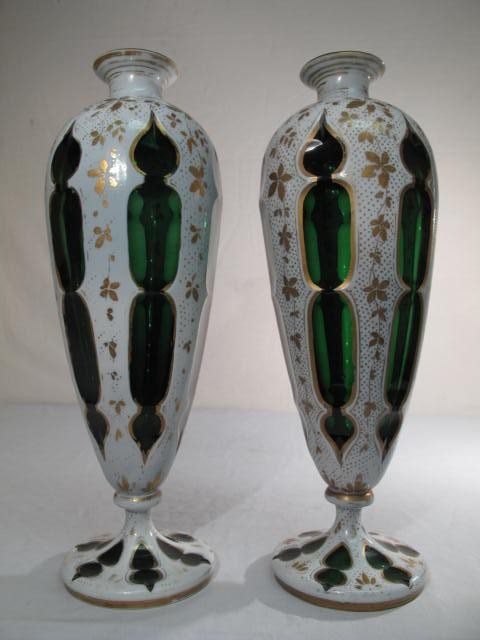 A pair of Bohemian green glass