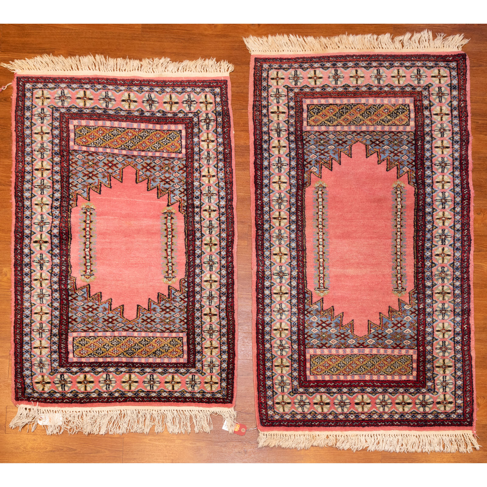 A PAIR OF BOHKARA RUGS, PAKISTAN